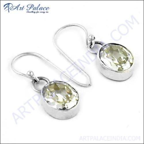 Elegant silver earrings adorned with simple cubic zirconia gemstones, showcasing a sophisticated design.