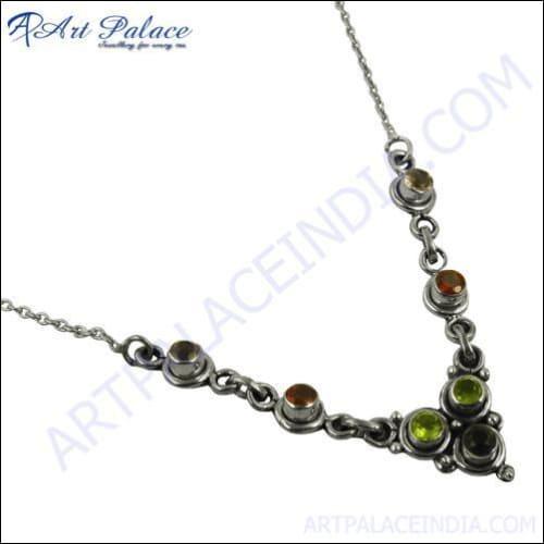 Elegant Silver Necklace featuring Amethyst, Garnet, Iolite, and Peridot gemstones, showcasing vibrant colors and intricate craftsmanship.
