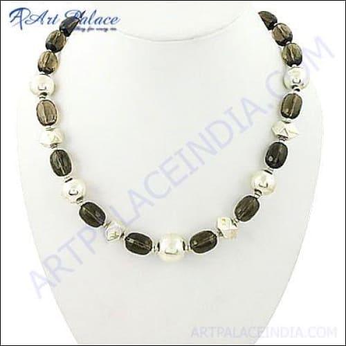 Elegant Smokey Quartz Silver Necklace featuring a genuine smokey quartz pendant on a sterling silver chain, showcasing its unique handmade design.