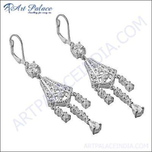 Elegant traditional silver earrings featuring cubic zirconia gemstones, showcasing intricate design and sparkling brilliance.