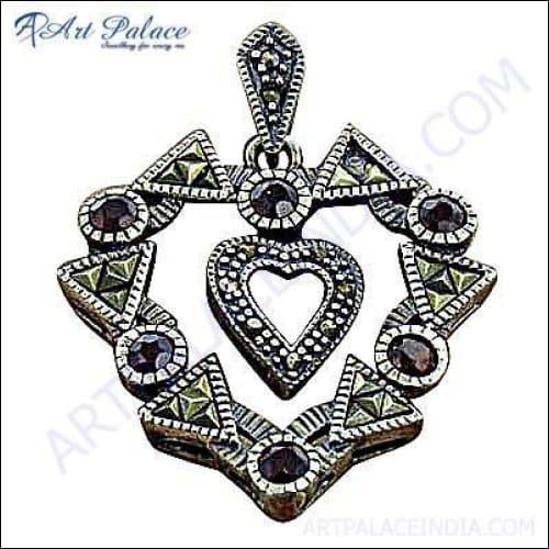 Elegant Traditional Party Wear Pendant featuring a deep red garnet gemstone set in 925 silver, showcasing intricate craftsmanship.