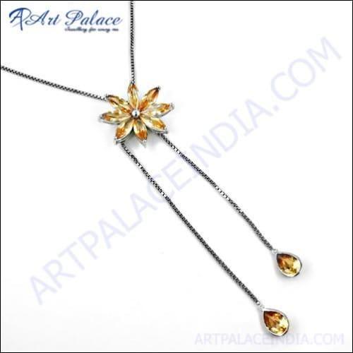 Elegant Zirconia Gemstone Silver Necklace featuring a unique rocking flower design, showcasing sparkling zirconia gemstones on a silver chain.