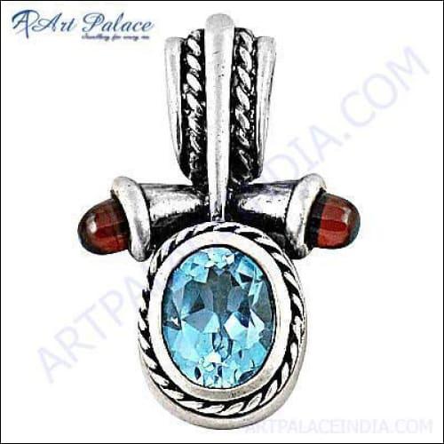 Ethnic Designer Blue Topaz & Garnet Gemstone Silver Pendant showcasing intricate design and vibrant gemstones.