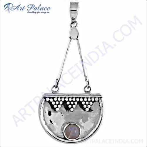 Ethnic Silver Gemstone Rainbow Moonstone Pendant showcasing intricate silver work and a vibrant rainbow moonstone centerpiece.