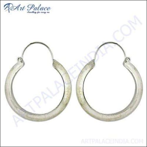 A pair of elegant plain silver hoop earrings, showcasing a classic design with a polished finish, perfect for any occasion.