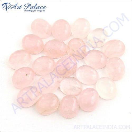 A stunning loose rose quartz gemstone showcasing its soft pink hue and natural variations, perfect for jewelry making.