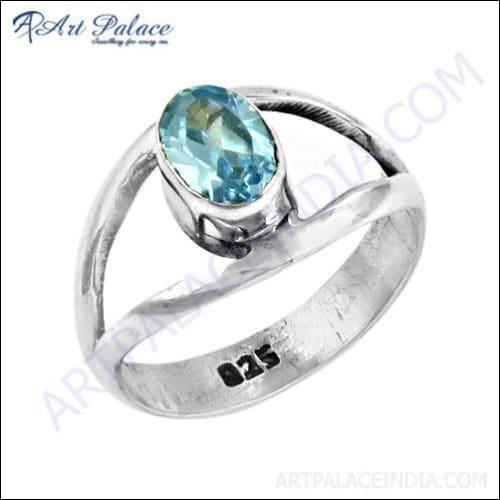 Extra Shine Blue Topaz Cubic Zirconia set in 925 Sterling Silver, showcasing a vibrant blue gemstone with sparkling accents.