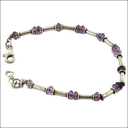 Handmade Indian silver bracelet featuring genuine amethyst gemstones, showcasing exquisite craftsmanship and elegant design.