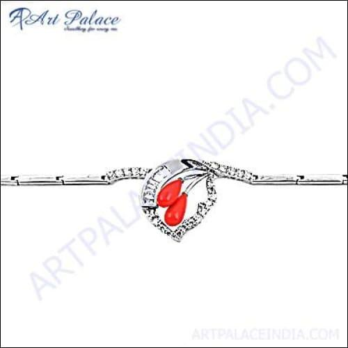 Fashionable 925 silver bracelet featuring sparkling cubic zirconia and vibrant synthetic coral gemstones, handcrafted by artisans in Jaipur.