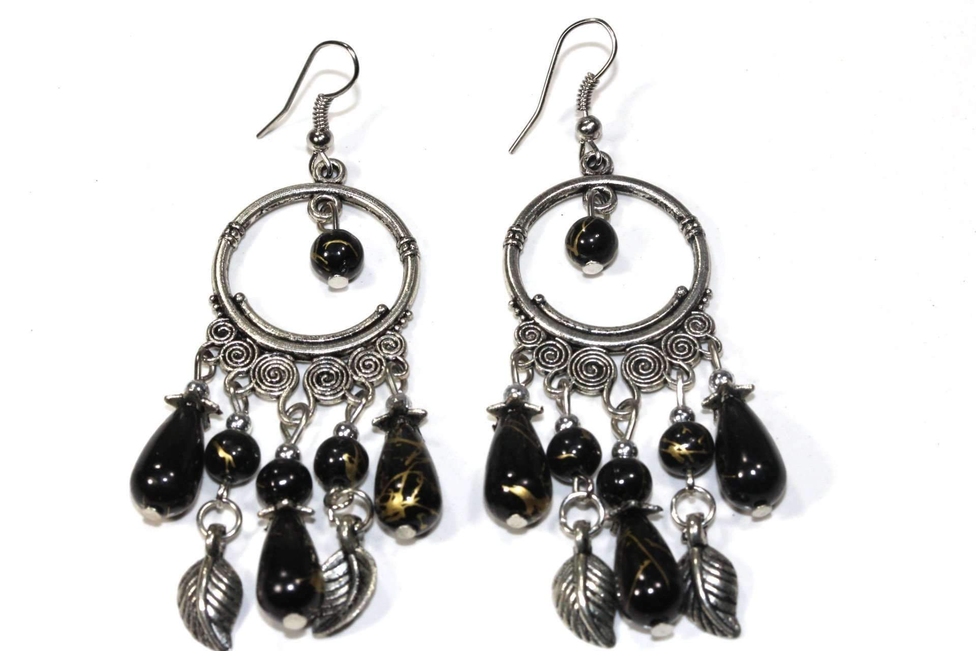Elegant Flow Or Flair Versatile Dangler Earrings in deep black and maroon with golden shimmer and leaf charms.