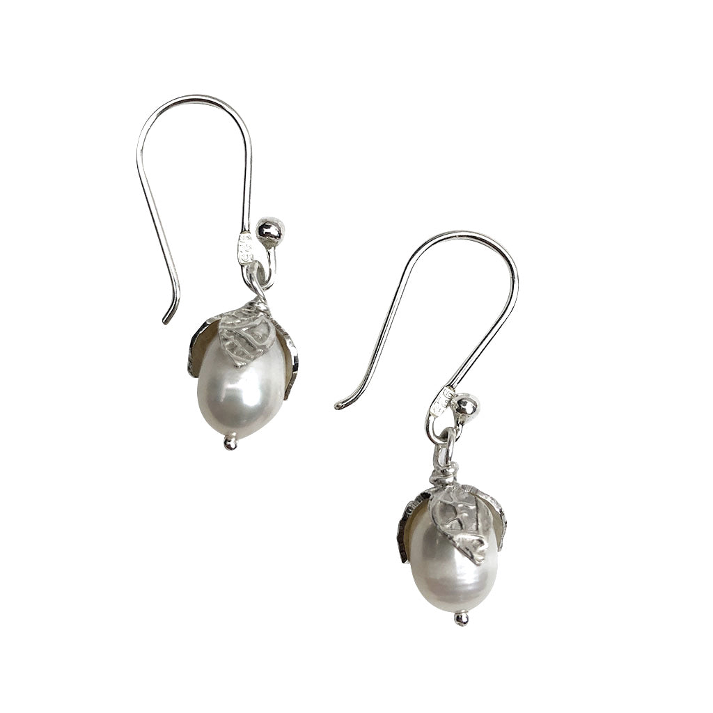 Elegant Freshwater Pearl Teardrop Earrings with intricate leaf detail, handmade in Peru.