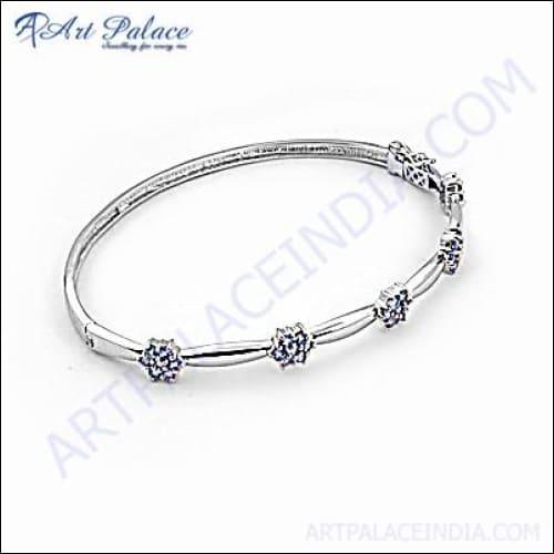 A stylish Girls' Fashionable Cubic Zirconia Silver Bracelet featuring sparkling stones set in a silver base, perfect for parties and special occasions.