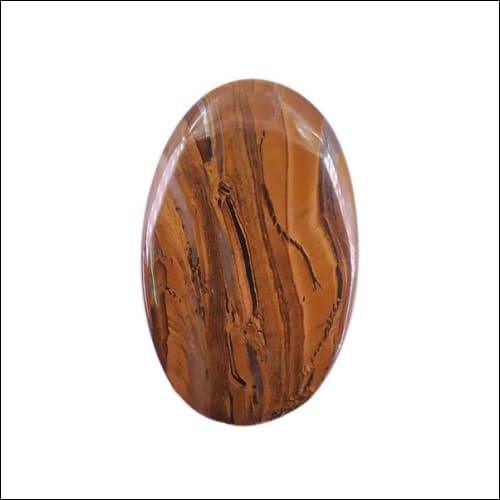 A collection of Glitzy American Tiger Stone Oval Cabochon Gemstones showcasing their unique colors and patterns, perfect for jewelry making.