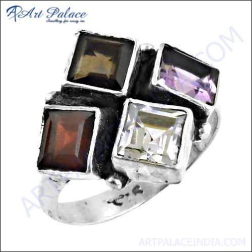 Graceful silver ring featuring amethyst, CZ garnet, and smokey quartz gemstones, showcasing intricate design and craftsmanship.