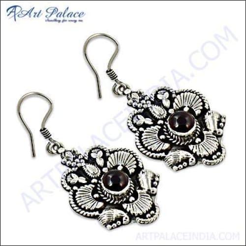 Graceful Garnet Silver Earrings featuring a stylish flower design, showcasing intricate craftsmanship and genuine garnet stones.