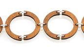 Half Circle Bracelet 7508C in cinnamon color, made from sustainably sourced wood, featuring a stylish half circle design.
