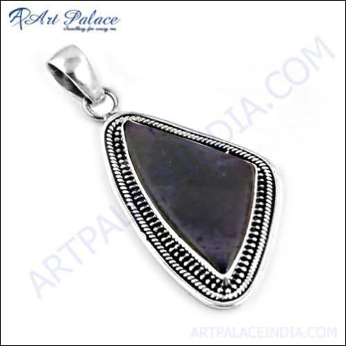 Handcrafted Indian silver pendant featuring a vibrant Charoite gemstone, showcasing intricate detailing and elegant design.