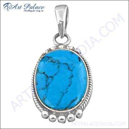 Handcrafted Indian turquoise and silver pendant showcasing intricate design and vibrant colors, perfect for elegant occasions.