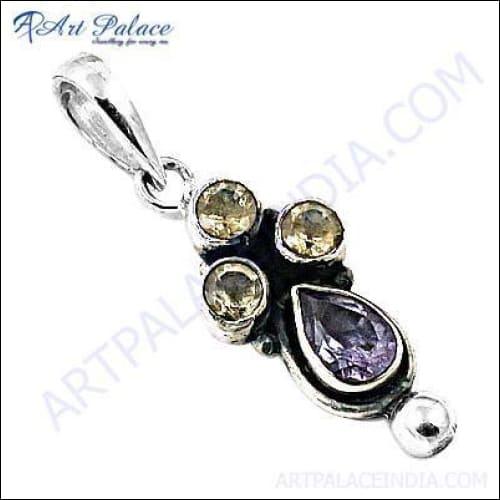 Handcrafted Indian silver pendant featuring amethyst and citrine gemstones, showcasing intricate design and vibrant colors.