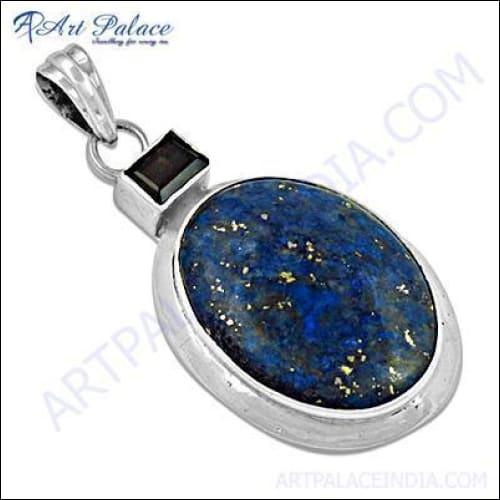 Hand-crafted silver gemstone pendant featuring Lapis and Smokey Quartz, showcasing intricate design and craftsmanship.