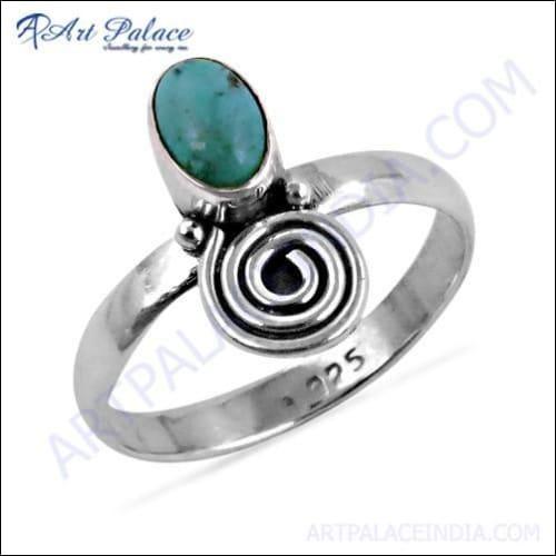 Handcrafted Turquoise Gemstone Ring featuring a vibrant blue-green gemstone set in a 925 sterling silver band, showcasing artisan craftsmanship.