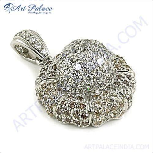 Handcrafted silver pendant featuring yellow and white cubic zirconia stones, showcasing a unique and elegant design.