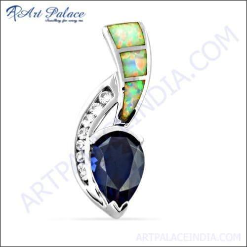 Handcrafted silver pendant featuring a unique zirconia inlay and a stunning iolite gemstone, showcasing exquisite craftsmanship.