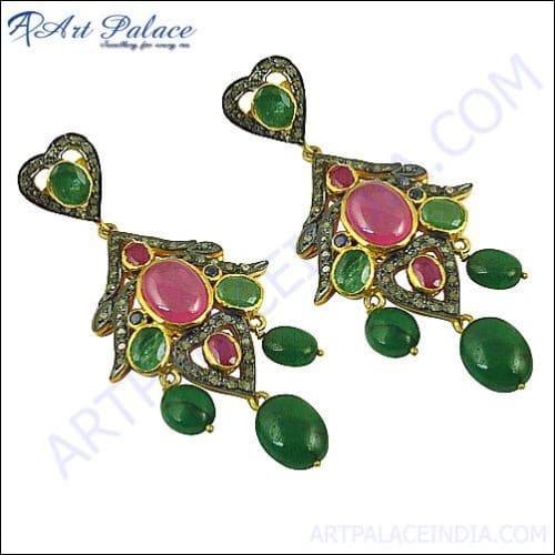 Hand-finished Victorian diamond earrings featuring vibrant emerald and ruby stones, showcasing exquisite craftsmanship and elegant design.