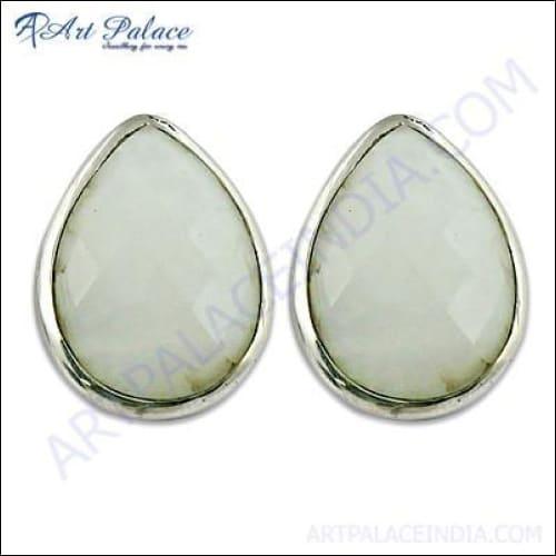 Handmade 925 sterling silver earrings featuring white onyx gemstones, showcasing a unique and elegant design.