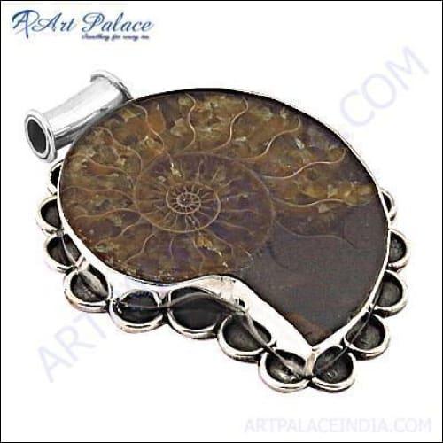 Handmade silver pendant featuring a stunning ammonite gemstone with intricate spiral patterns, perfect for party wear.