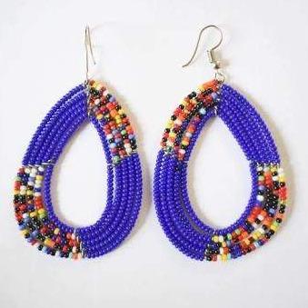 A pair of handmade beaded drop earrings featuring vibrant multi-color African seed beads in an elegant oval shape.