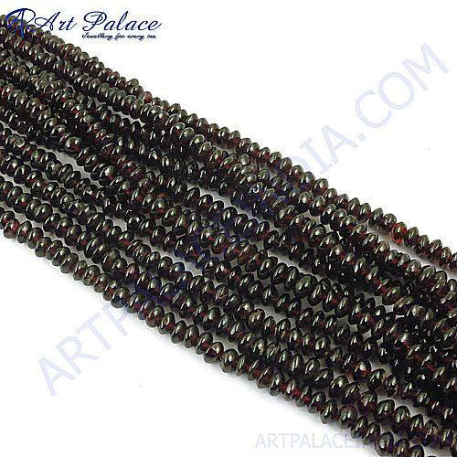 Handmade faceted garnet gemstone beads strands showcasing vibrant red hues and elegant facets, perfect for jewelry making.