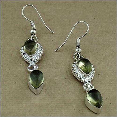 Handmade Long Silver Prehnite Dangle Earrings featuring elegant design and beautiful green stones, perfect for festivals.