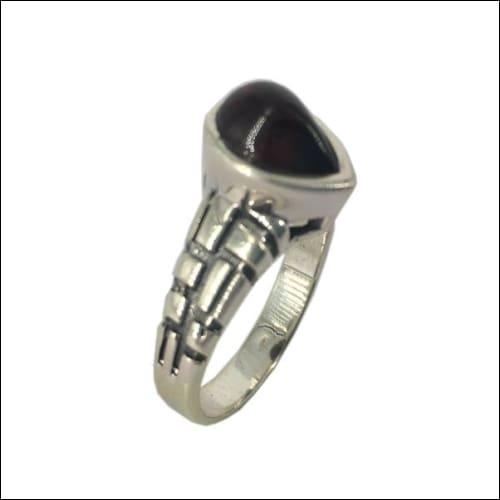 A beautifully crafted Handmade Garnet Stone 925 Silver Ring featuring a deep red garnet set in high-quality silver, showcasing intricate design and craftsmanship.