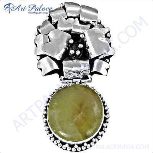Handmade silver pendant featuring a unique golden rutilated quartz gemstone, showcasing intricate details and craftsmanship.