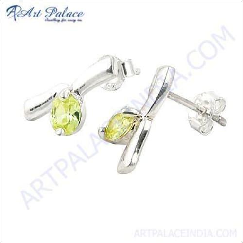 Handmade silver earrings featuring beautiful green amethyst gemstones, showcasing intricate craftsmanship and elegant design.