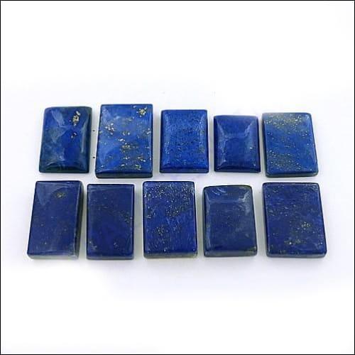 Handmade Lapis Lazuli Cabochon Gemstone showcasing its vibrant blue color and unique markings, perfect for versatile jewelry designs.