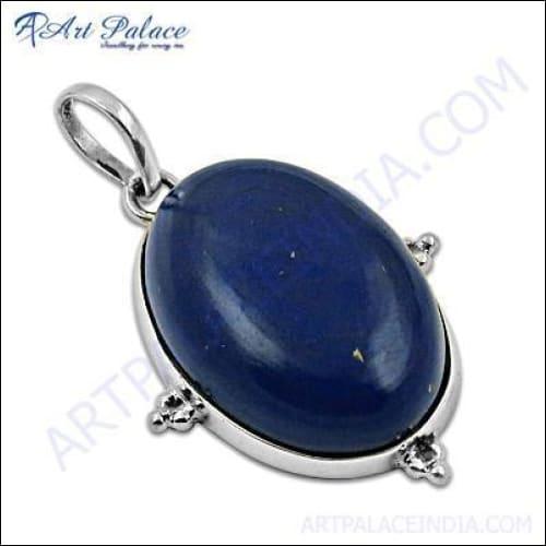 Handmade silver pendant featuring a vibrant lapis lazuli gemstone, showcasing unique artisan craftsmanship.