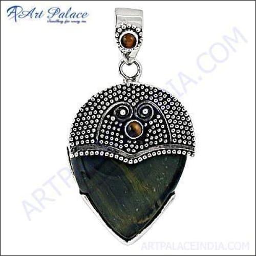 Handmade silver pendant featuring a stunning Black Tiger Eye gemstone with intricate ethnic design, showcasing craftsmanship and elegance.