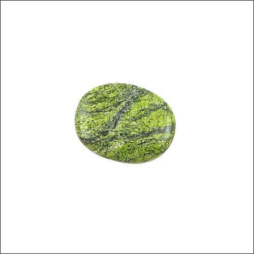 A collection of high-quality cabochon-cut semi-precious gemstones in various colors, showcasing their smooth surfaces and vibrant hues.