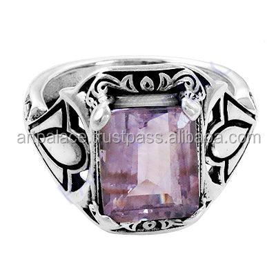 A beautiful Invisible Sterling Silver Amethyst Gemstone Ring showcasing a vibrant purple amethyst in a sleek setting.
