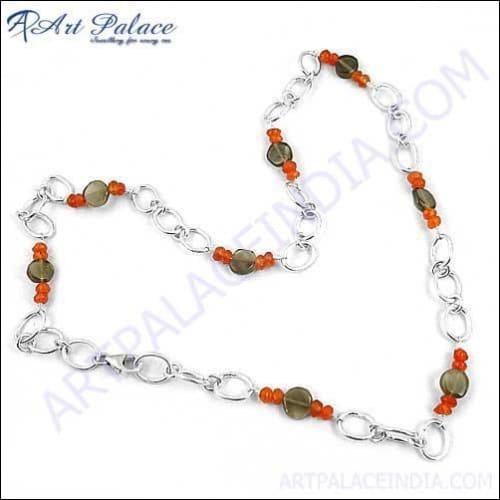 A beautifully handcrafted necklace featuring red onyx and smokey quartz beads, showcasing exquisite craftsmanship and elegant design.