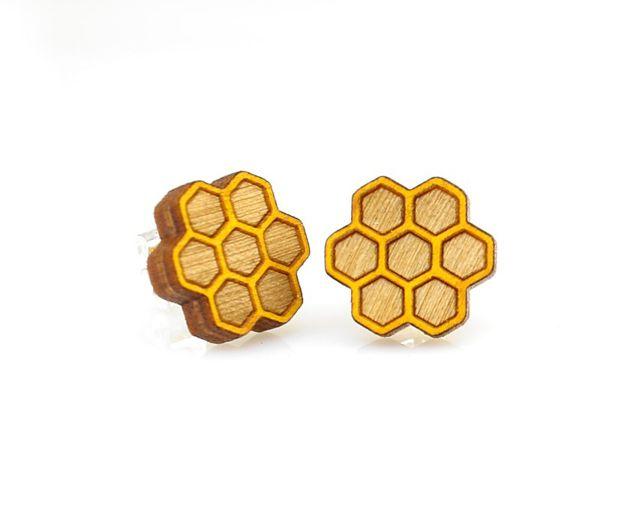 A pair of Honeycomb Stud Earrings #3011 made from lightweight laser-cut wood, featuring a stylish honeycomb design and silver plated brass earstuds.