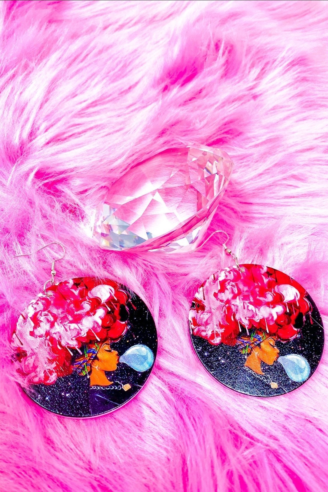 Pink Afro Queen Hoop Drop Earrings made of wood with brass ear hooks, showcasing a vibrant pink color and cultural design.