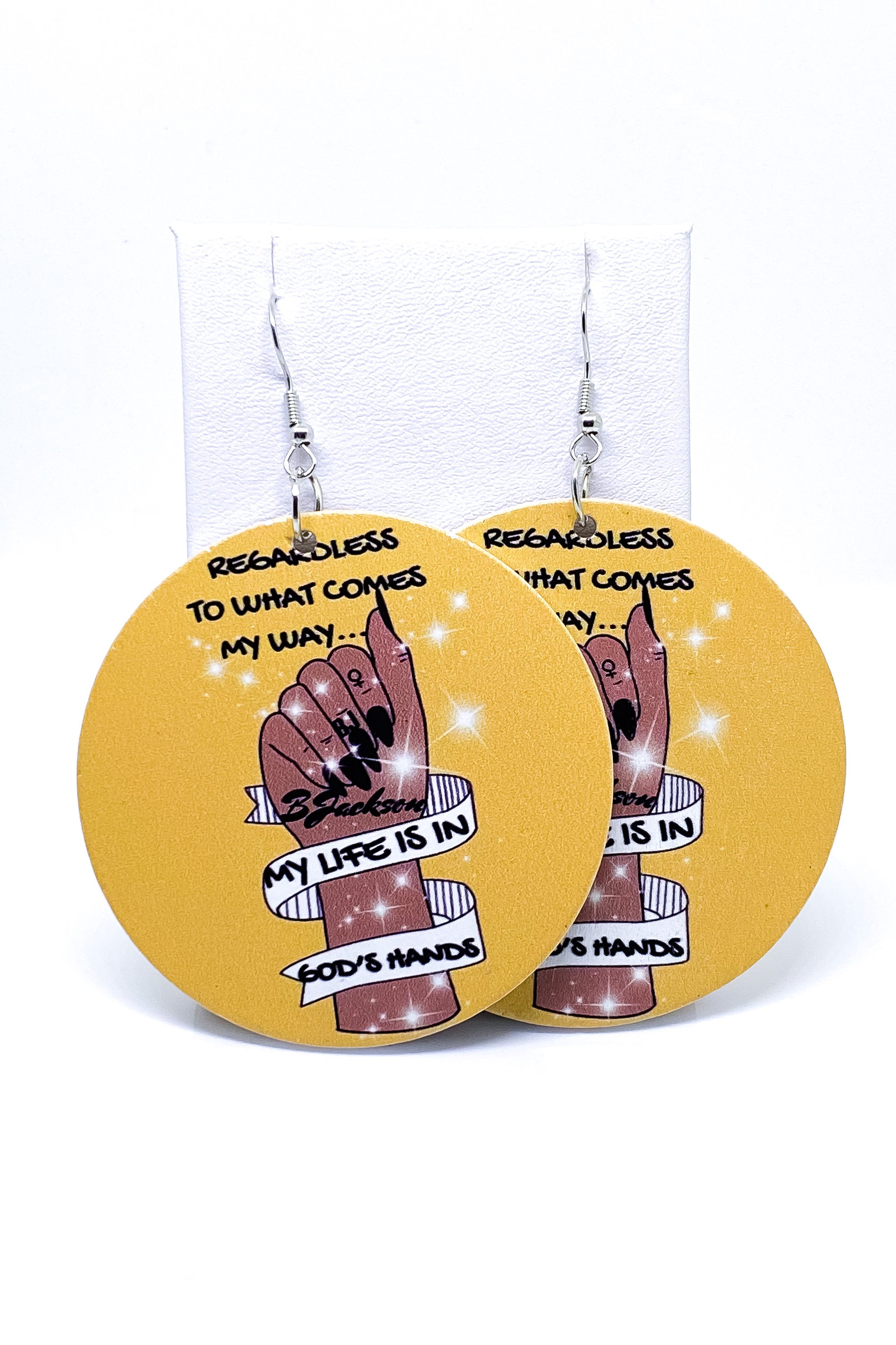 Stylish handmade wooden hoop earrings with black finish and brass ear hooks, featuring a unique back print design.