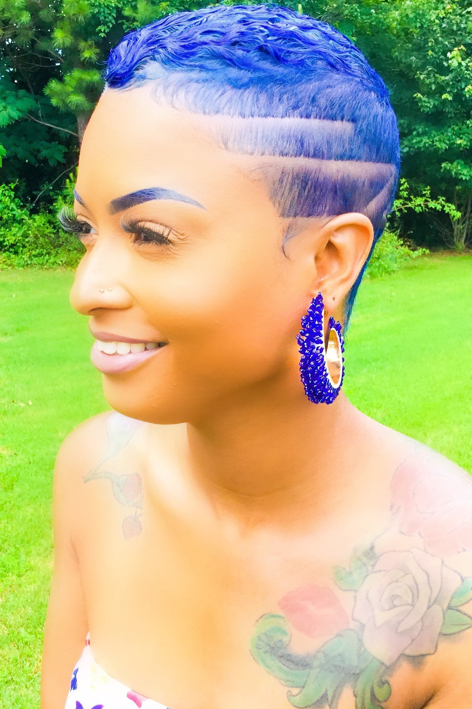 A pair of stylish Summer Hoops earrings in purple and tan, featuring a geometric design made from high-quality zinc alloy and pastique beads.