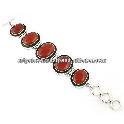 Luxury Red Onyx Gemstone Silver Bracelet showcasing intricate craftsmanship and a stunning red onyx stone.