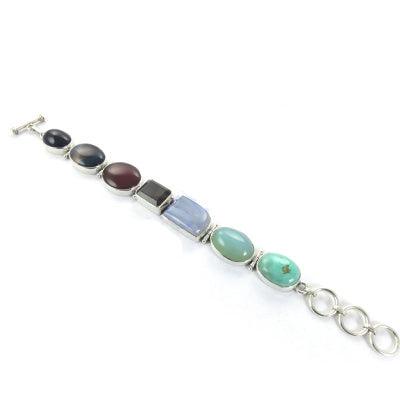A vibrant Indian Design Gemstone 925 Silver Bracelet featuring colorful gemstones set in high-quality sterling silver, handcrafted by Art Palace, Jaipur.