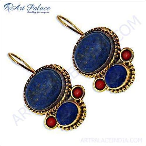 Handmade Indian design silver earrings featuring coral and lapis gemstones, showcasing intricate craftsmanship and vibrant colors.