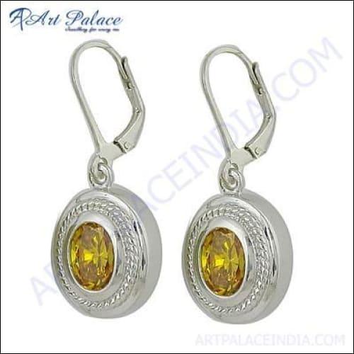 Elegant Indian Designer Yellow Cubic Zirconia Silver Earrings showcasing intricate craftsmanship and vibrant gemstones.